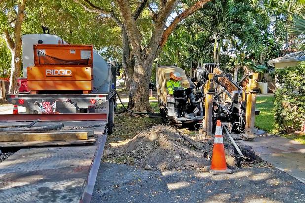 FPL workers place underground cables