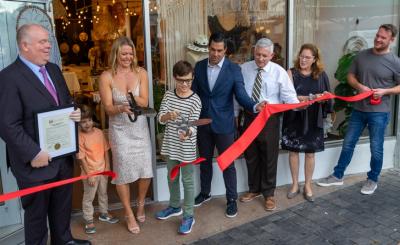 ben and giules ribbon cutting